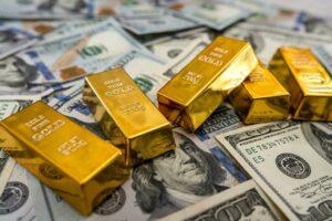 Золото подешевело после роста его цены в течение восьми торговых сессий